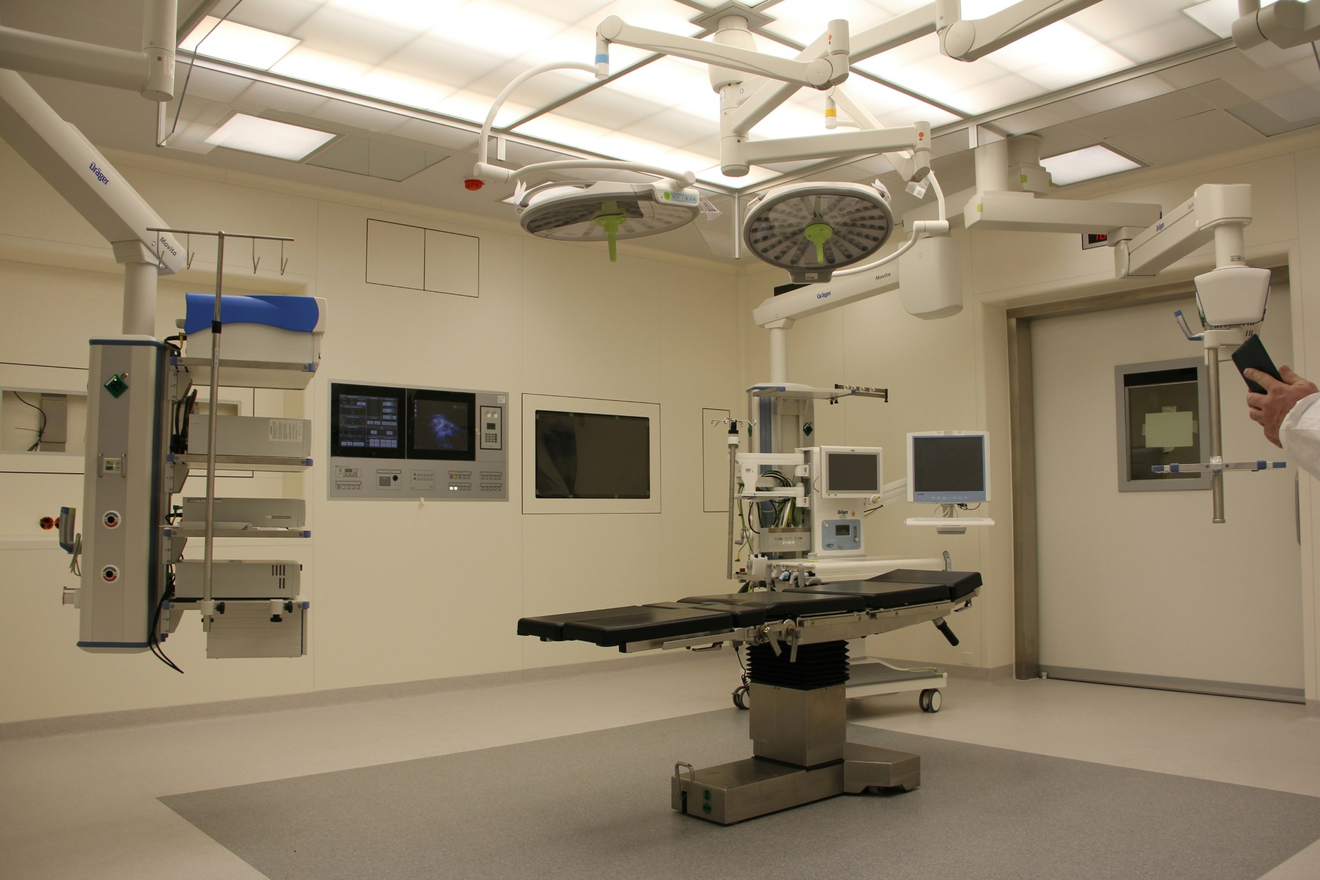 Infertility clinic – hopeful couple with doctor